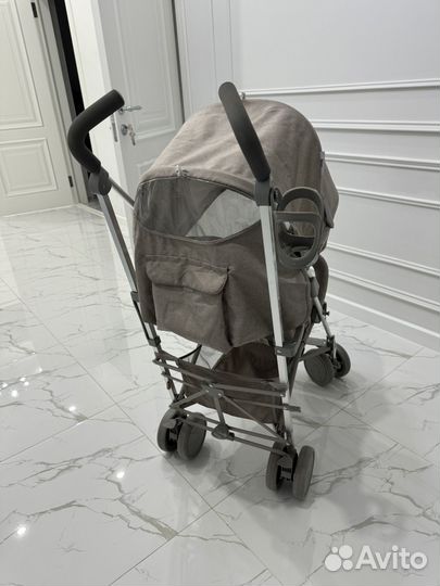 Прогулочная коляска трость