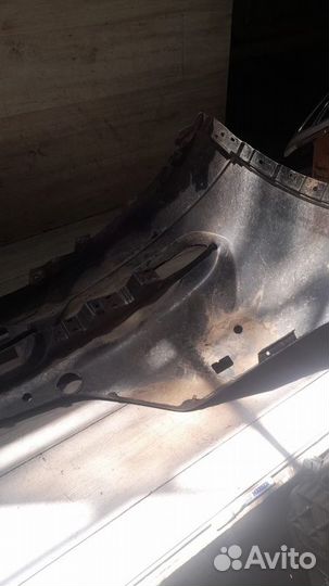 Бампер передний под парктроники и омыватели Mazda