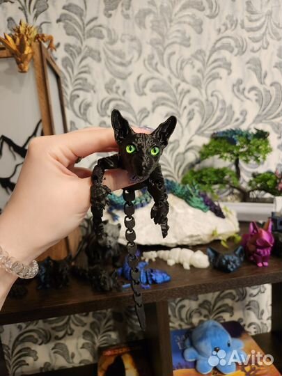 Подвижная игрушка сфинкс