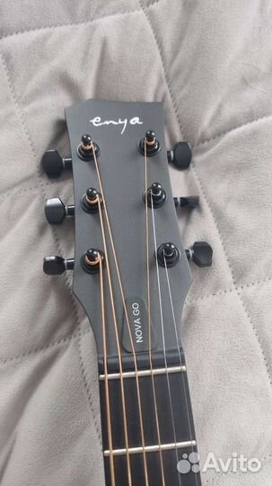 Продам трансакустическую гитару enya nova go