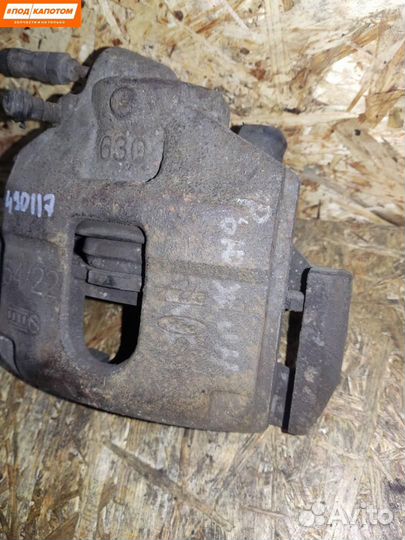 Суппорт тормозной передний правый Ford Fusion