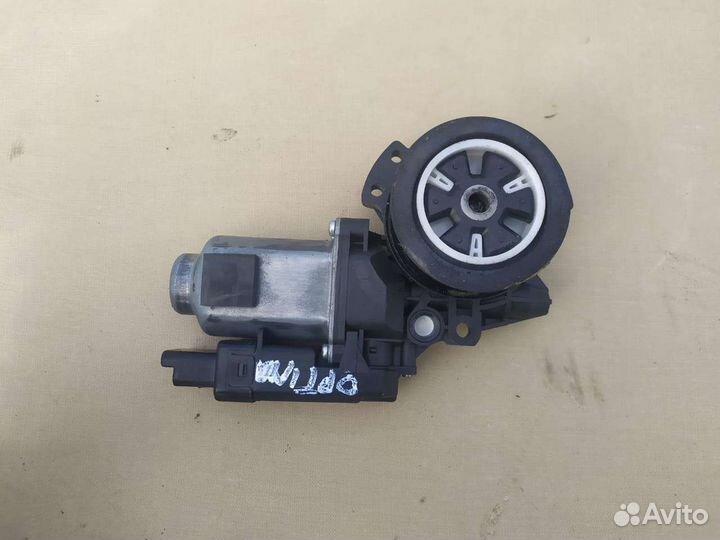 Моторчик стеклоподъемника Kia optimaлевый перед