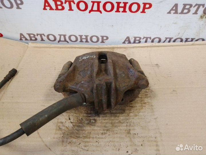 Суппорт тормозной передний левый Peugeot 307