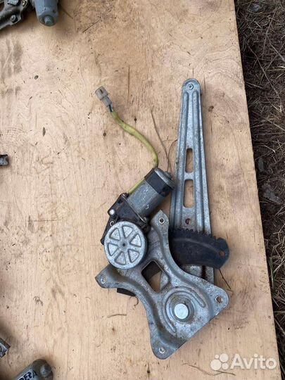 Стеклоподьемник задний левый Geely Mk