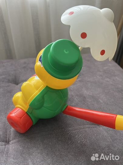 Игрушка каталка с ручкой