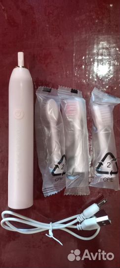 Электрическая зубная щетка