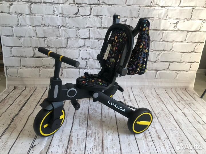 Детский трехколесный велосипед 7в1