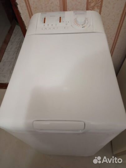 Стиральная машина с вертикальной загрузкой