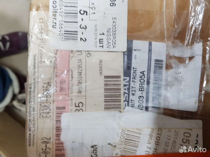 Амортизатор передний левый Nissan