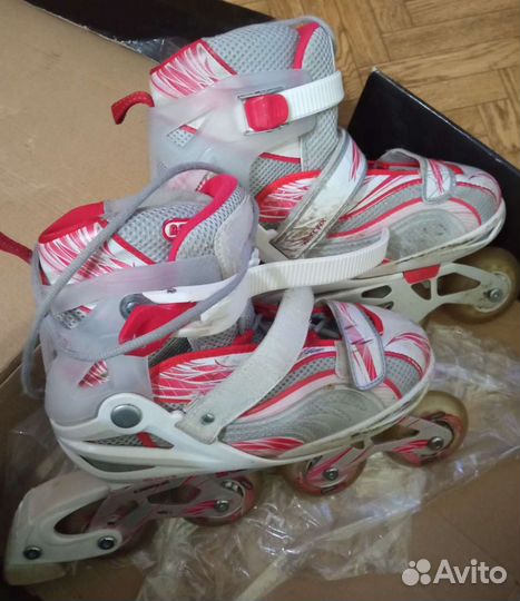 Роликовые коньки