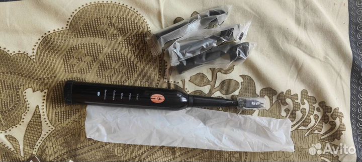 Электрическая зубная щётка