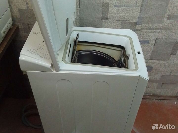 Стиральная машина с вертикальной загрузкой