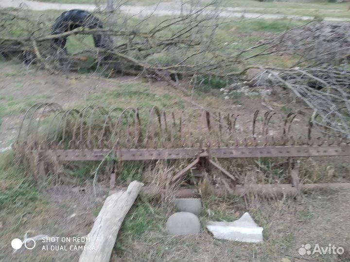 Косилка сегментная с граблями и ёмкость