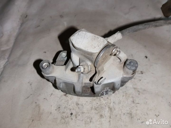 Суппорт тормозной задний правый Ford Focus 2