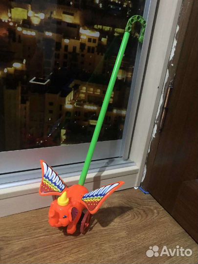 Игрушка каталка бабочка