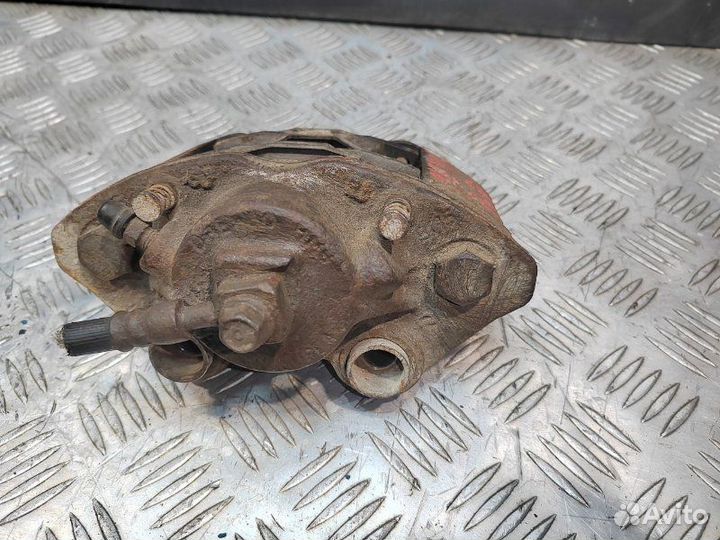 Суппорт тормозной передний левый Daewoo Nexia