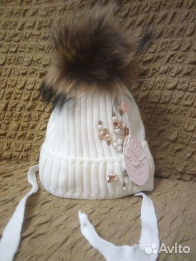 Шапка с бубоном из натурального меха