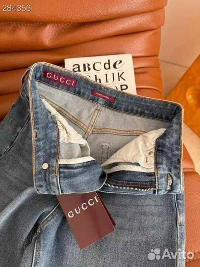 Джинсы gucci женские