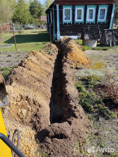 Услуги мини экскаватора. Мини трактор аренда