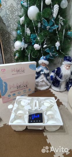 Электрический молокоотсос Milatec Mama bloom