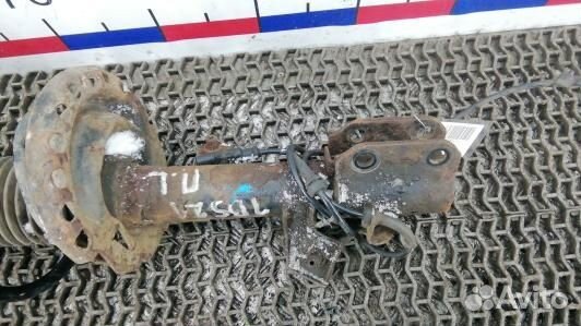 Стойка передняя левая nissan note E11 (1BS21K501)