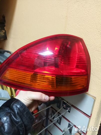 Фонарь задний левый Митсубиси Паджеро спорт 2