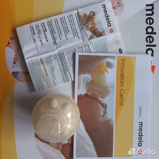 Молокоотсос Medela mini electric