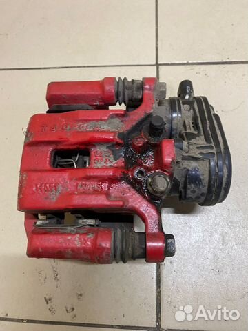 Суппорт задний левый Kia Optima 4 Рестайлинг