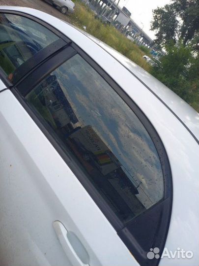 Стекло заднее левое Chery Bonus A13 2011-2014