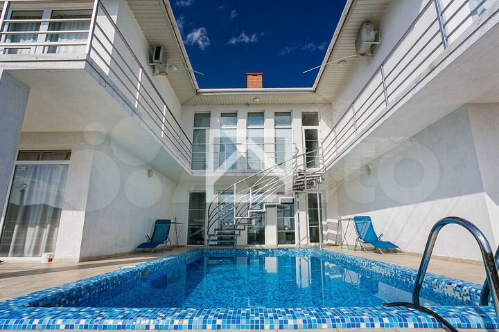 Дом 440,4 м² на участке 7 сот.