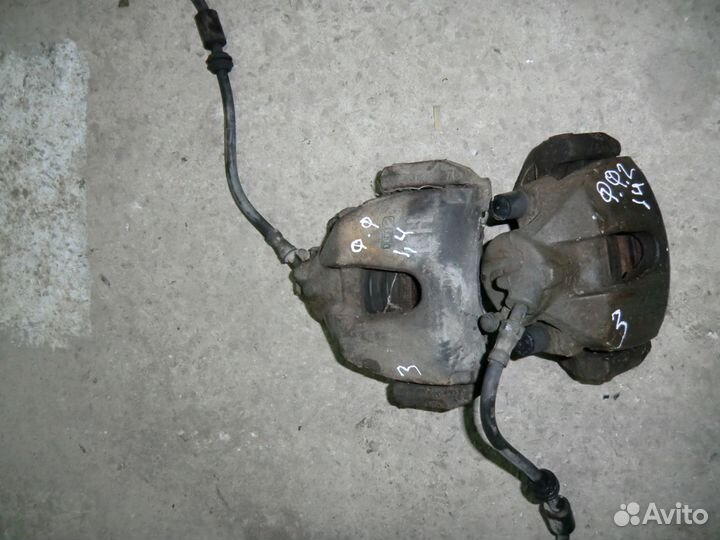 Суппорт передний правый левый Форд Фокус 2