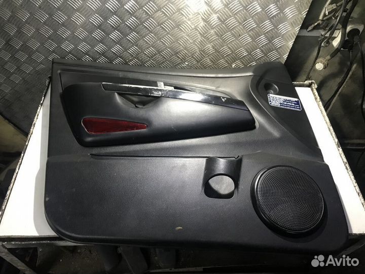 Обшивка двери передняя левая Ssang Yong Rexton 1