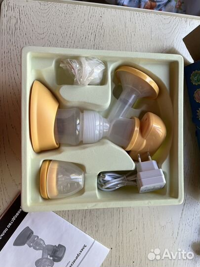 Молокоотсос электрический