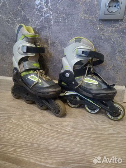 Роликовые коньки