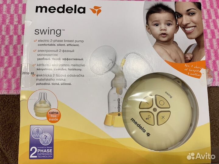 Молокоотсос medela swing электронный