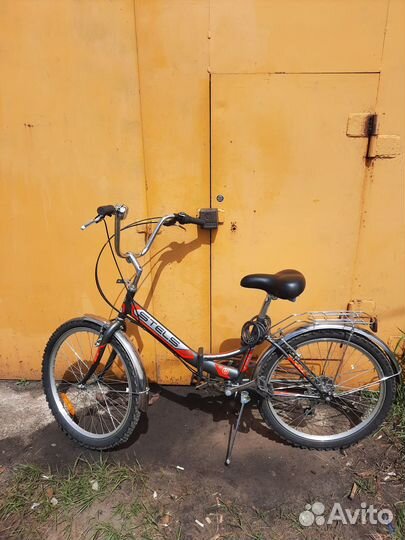 Велосипед складной Stels Pilot 750,цвет-черный