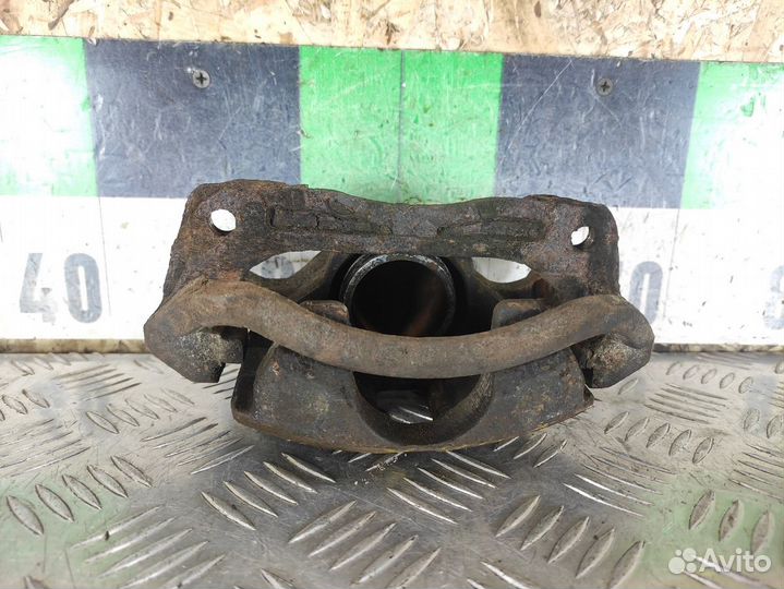 Суппорт передний левый Hyundai Accent 1994-2000