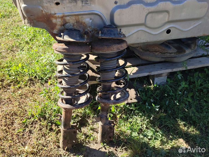 Kia sephia стойки передние