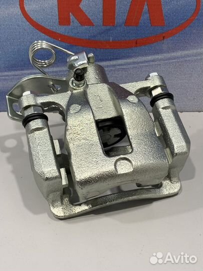 Суппорт тормозной задний Kia RIO 3 Лев