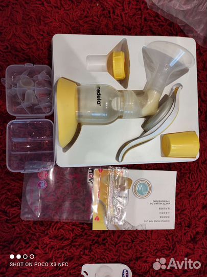 Молокоотсос medela ручной