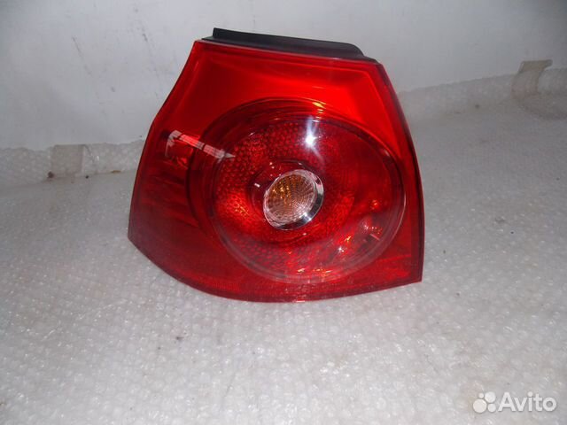 Фонарь задний наружный левый VW golf V 110400012