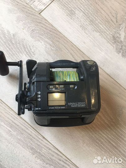 Катушка с удочкай для морской рыбалки