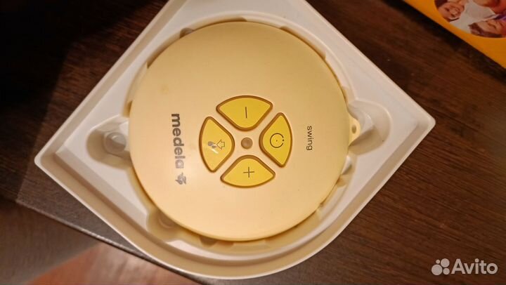 Молокоотсос medela swing электрический