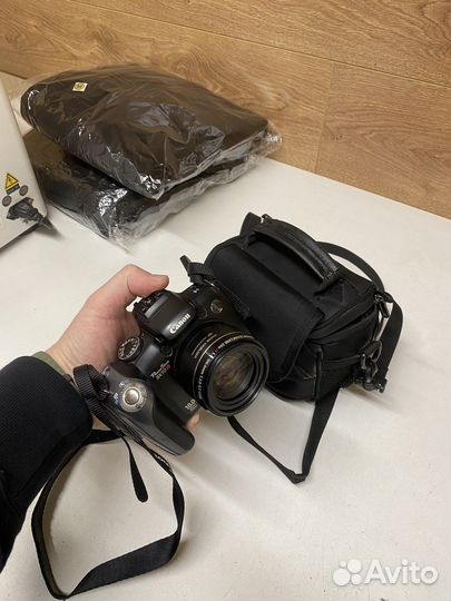 Зеркальный фотоаппарат canon sx10is