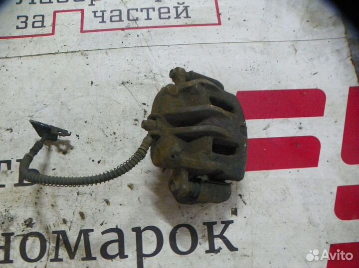 Суппорт тормозной передний левый Hyundai Santa Fe