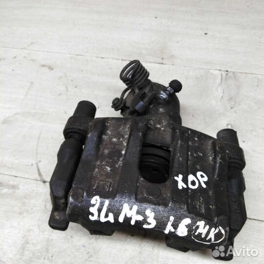 Суппорт задний левый Mazda 3 BK