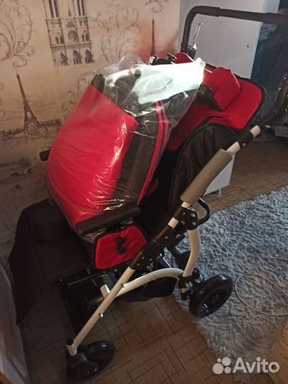 Инвалидная детская коляска