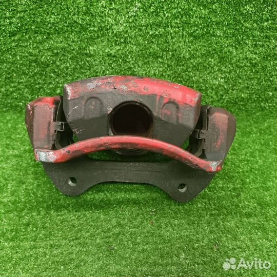 Суппорт тормозной передний правый Opel Astra J GTC