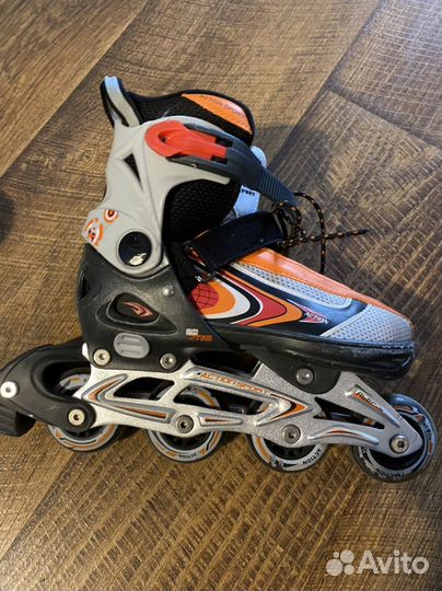 Роликовые коньки