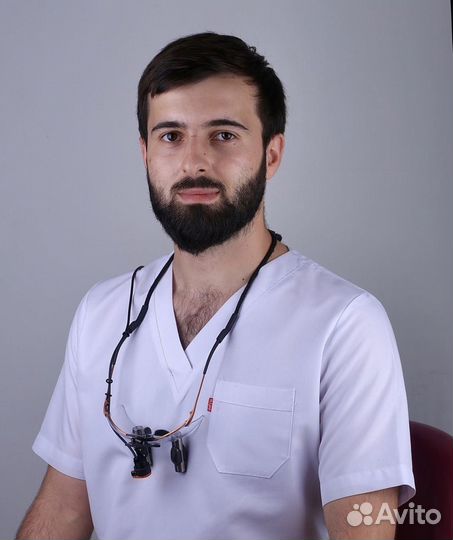 Врач стоматолог